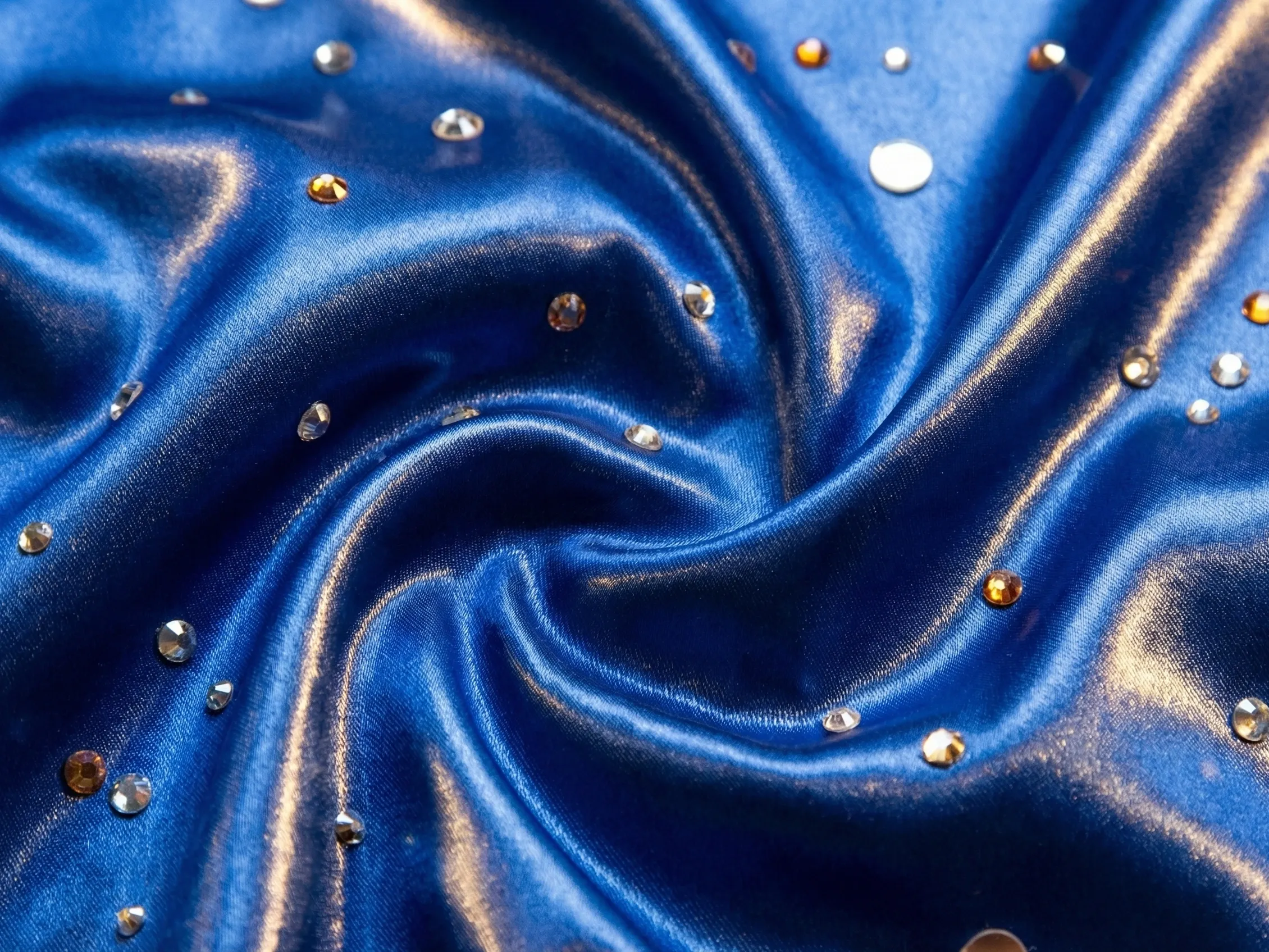 Close-up of satin fabric used in premium Laddu Gopal poshak at Gopalji Fashion